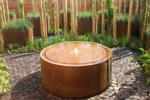 Comment aménager votre jardin avec une fontaine en acier CorTen en France ?