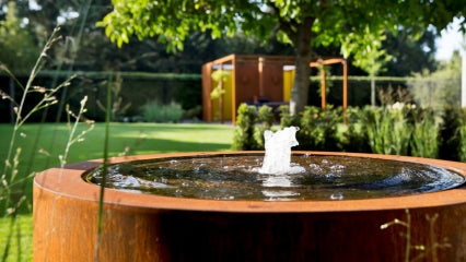 Fontaine ou bassin en Corten : un atout pour votre jardin